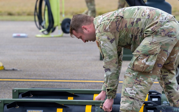 174th Attack Wing weapons specialist unloads AGM-114 Hellfire during Sentry South 26-2