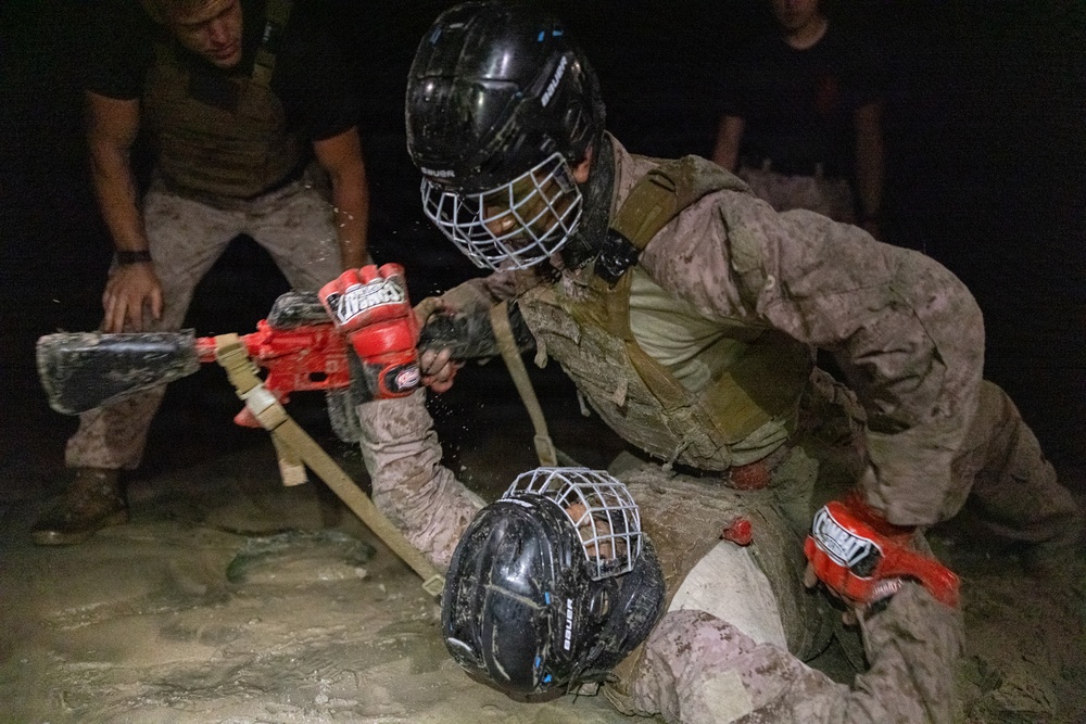 U.S. Marines with Martial Arts Instructor Course 48-26 participate in culminating event