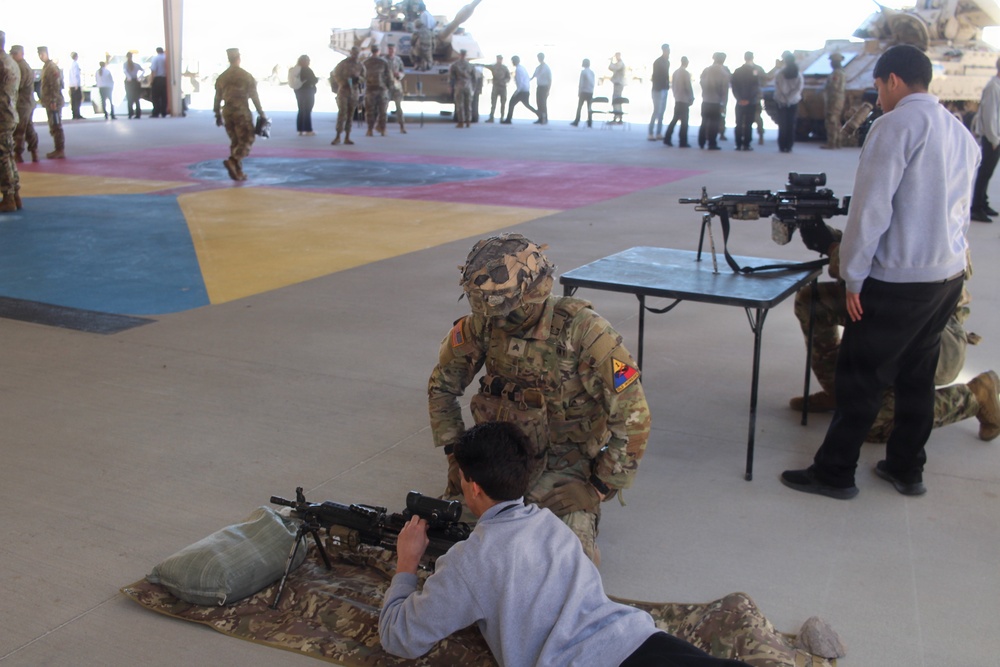 Students gets hands-on experience during Partners in Education event.