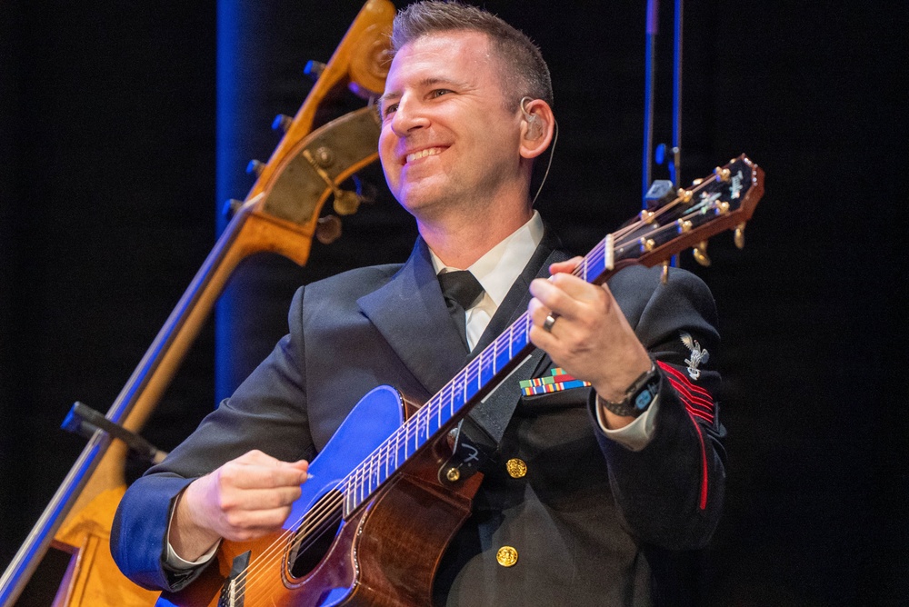 Musician 1st Class Ryan Connelly performs at the Klein Memorial Hall in Bridgeport, CT