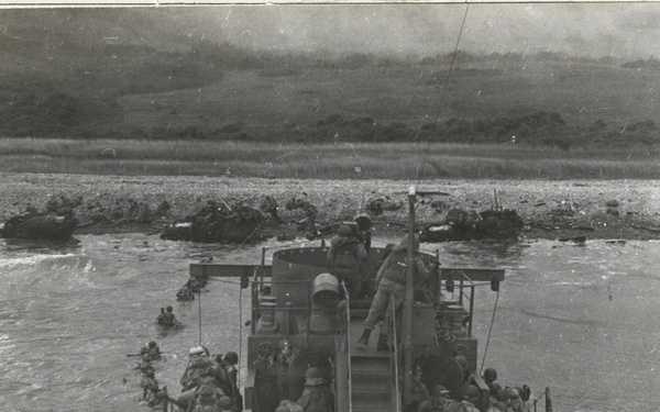 US Army Infantry Disembark From Bow of USS LCI(L) 412 at Omaha Beach, Normandy, France on D-Day