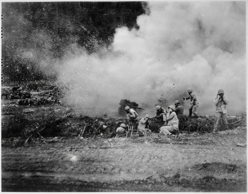The Rockets Red Glare-U.S. Marines launch a 4.5 rocket barrage against the Chinese Communists in the Korean fighting.