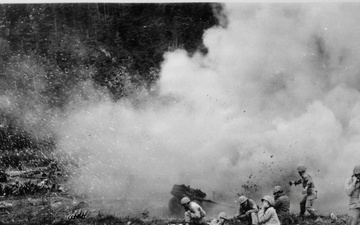 The Rockets Red Glare-U.S. Marines launch a 4.5 rocket barrage against the Chinese Communists in the Korean fighting.