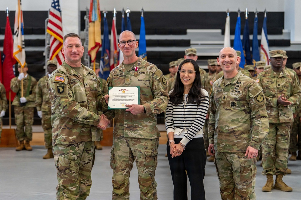 Maj. Jason A. Reinhardt, outgoing commander of the 498th Combat Sustainment Support Battalion (CSSB) received the Meritorious Service Medal from Col. R. Scott Carpenter, MSC-K commander prior to a Change of Command Ceremony at Camp Carroll on March 3.