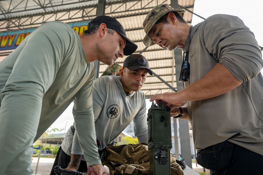 U.S. Navy and Royal Thai Navy EOD helocast from U.S. Army UH-60 Black Hawk