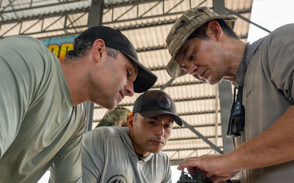 U.S. Navy and Royal Thai Navy EOD helocast from U.S. Army UH-60 Black Hawk