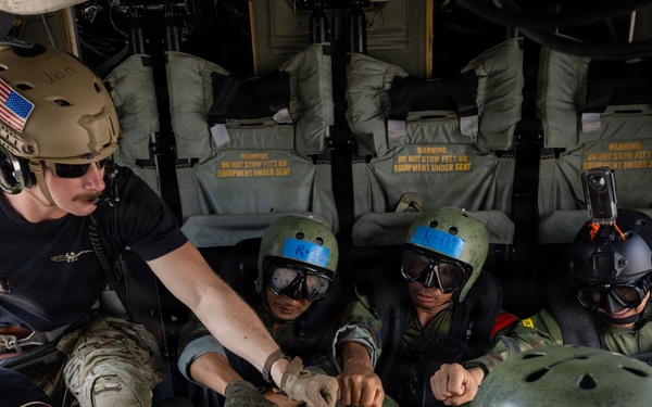 U.S. Navy and Royal Thai Navy EOD helocast from U.S. Army UH-60 Black Hawk