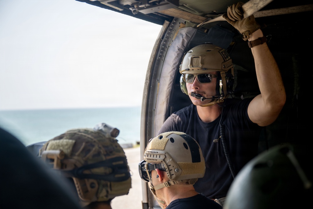 U.S. Navy and Royal Thai Navy EOD helocast from U.S. Army UH-60 Black Hawk