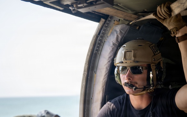 U.S. Navy and Royal Thai Navy EOD helocast from U.S. Army UH-60 Black Hawk