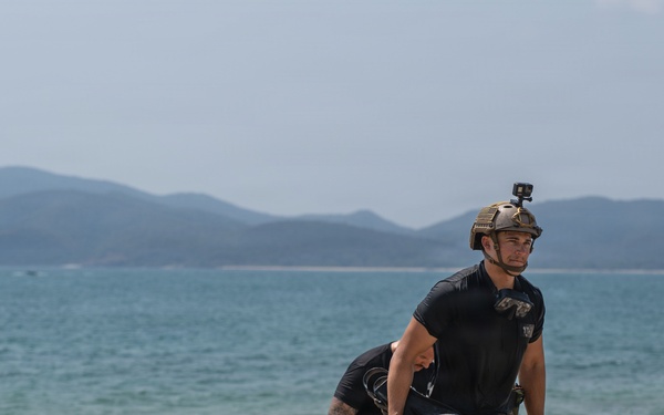 U.S. Navy and Royal Thai Navy EOD helocast from U.S. Army UH-60 Black Hawk