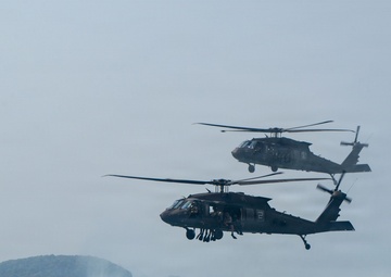 U.S. Navy and Royal Thai Navy EOD helocast from U.S. Army UH-60 Black Hawk