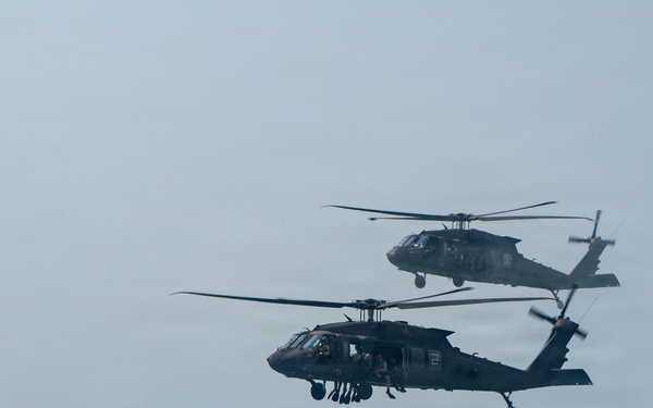U.S. Navy and Royal Thai Navy EOD helocast from U.S. Army UH-60 Black Hawk