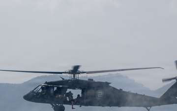 U.S. Navy and Royal Thai Navy EOD helocast from U.S. Army UH-60 Black Hawk