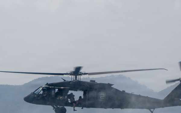 U.S. Navy and Royal Thai Navy EOD helocast from U.S. Army UH-60 Black Hawk