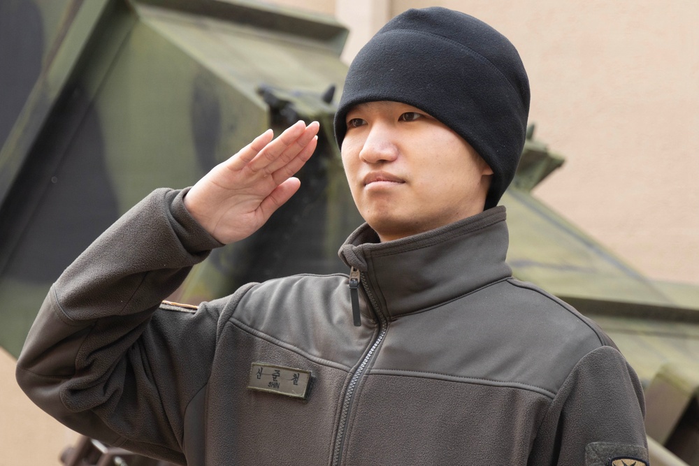 Sergeant Shin renders his final salute as he finishes his ETS ceremony.