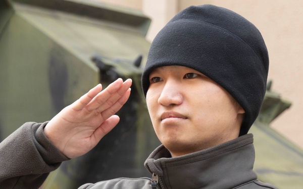Sergeant Shin renders his final salute as he finishes his ETS ceremony.