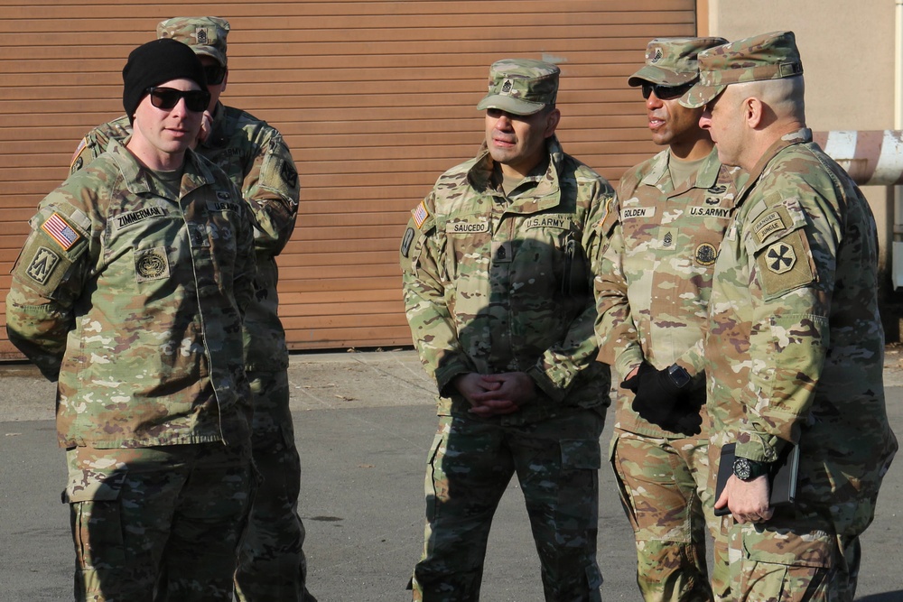 First Sergeant Zimmerman Presents to Command Sergeant Major Weaver