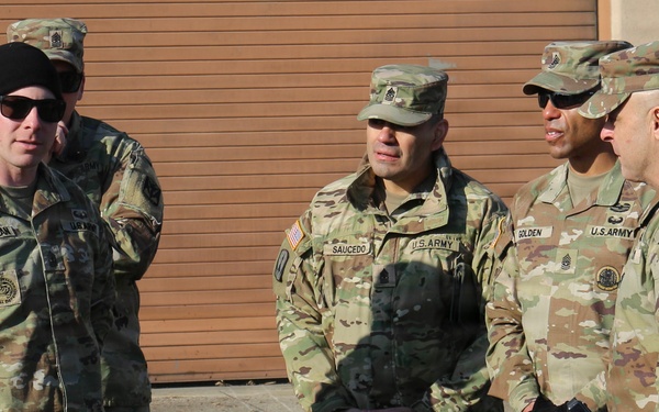 First Sergeant Zimmerman Presents to Command Sergeant Major Weaver