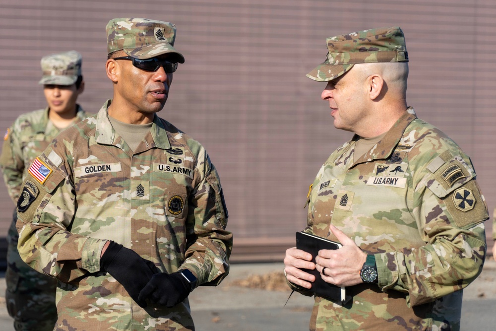 Command Sergeant Major Weaver and Golden have a conversation during Command Sergeant Major Weaver's visit to Osan Airbase