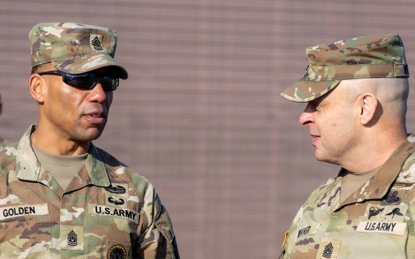 Command Sergeant Major Weaver and Golden have a conversation during Command Sergeant Major Weaver's visit to Osan Airbase