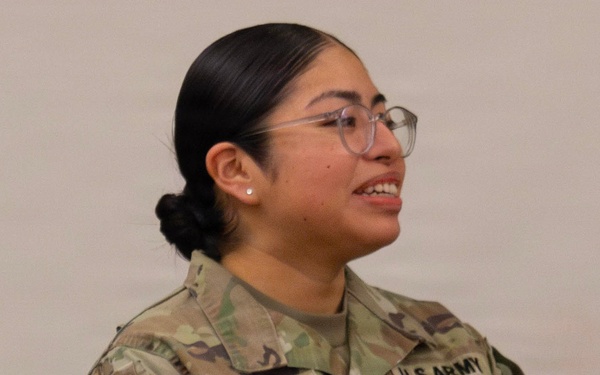 Sergeant Osorio is presented the Army Commendation Medal from the 35th Air Defense Artillery Brigade