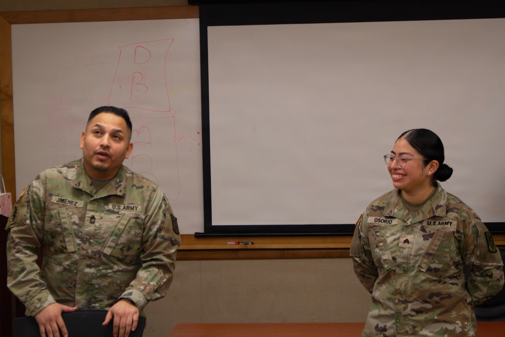 Sergeant Osorio is presented the Army Commendation Medal from the 35th Air Defense Artillery Brigade