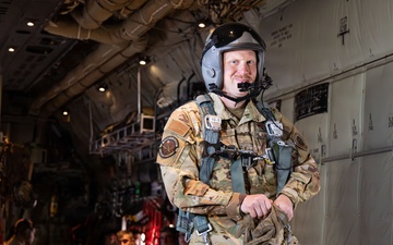 U.S. Air Force Master Sgt. Roger “Copper” Pettit prepares for a C-130 cargo operation.
