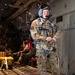 U.S. Air Force Master Sgt. Roger “Copper” Pettit prepares for a C-130 cargo operation.