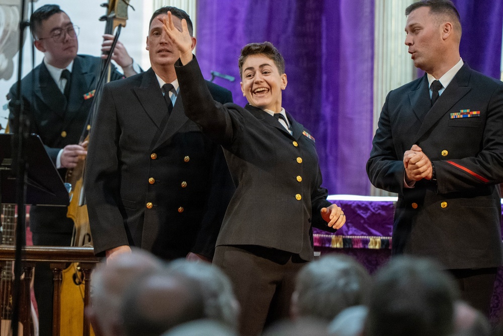 Chief Musician Amy Broadbent of the US Navy Band Sea Chanters performs at St. John's Episcopal Church in New Hampshire during their 2026 National Tour