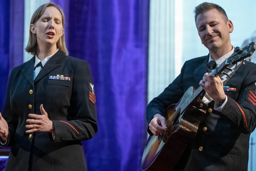 Musician 1st Class Rachael Coleman of the US Navy Band Sea Chanters performs at St. John's Episcopal Church in New Hampshire during their 2026 National Tour
