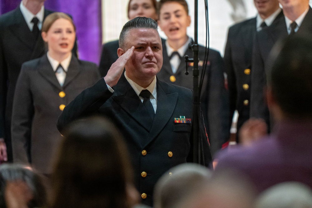 Chief Musician Robert Kurth of the US Navy Band Sea Chanters performs at St. John's Episcopal Church in New Hampshire during their 2026 National Tour