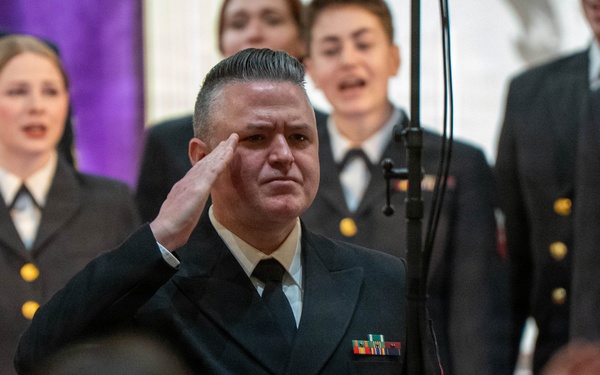 Chief Musician Robert Kurth of the US Navy Band Sea Chanters performs at St. John's Episcopal Church in New Hampshire during their 2026 National Tour