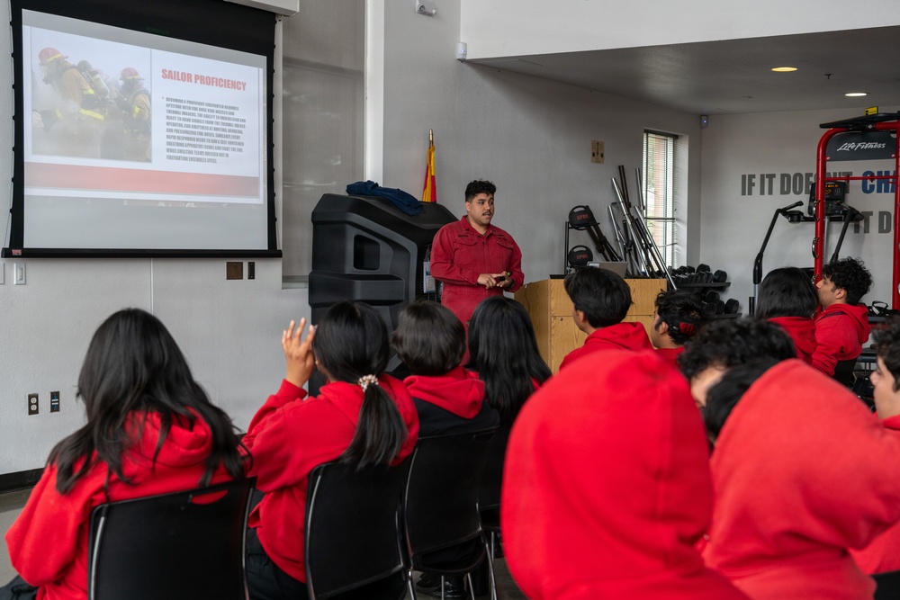 Navy Recruiter Returns to Alma Mater to Lead Damage Control Drill