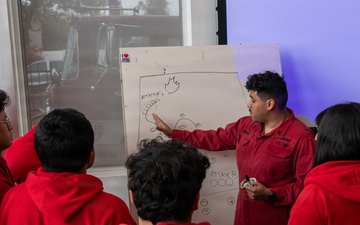 Navy Recruiter Returns to Alma Mater to Lead Damage Control Drill