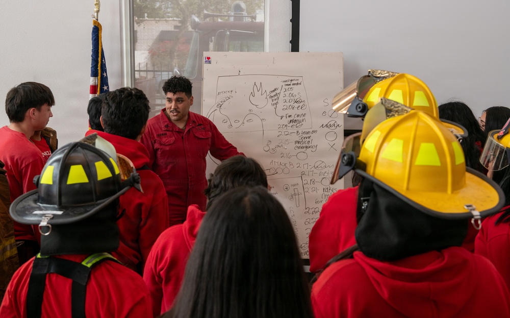 Navy Recruiter Returns to Alma Mater to Lead Damage Control Drill