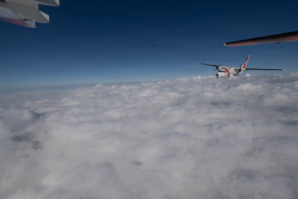 U.S. Coast Guard HC-144 Ocean Sentry flies above the clouds