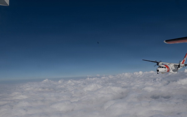 U.S. Coast Guard HC-144 Ocean Sentry flies above the clouds