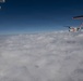 U.S. Coast Guard HC-144 Ocean Sentry flies above the clouds