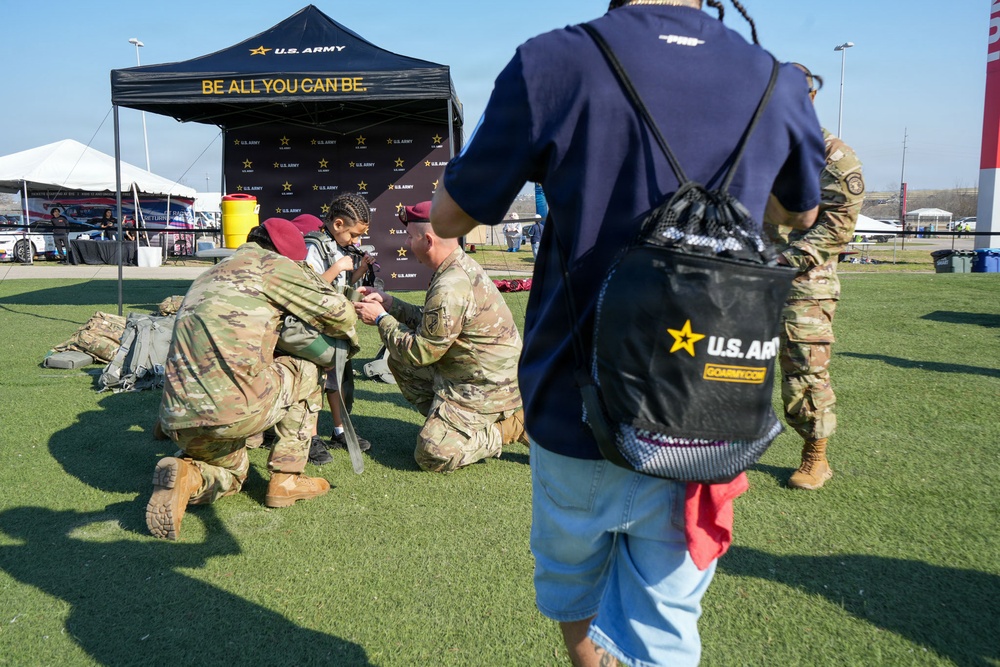 US Army Jump Masters help dawn T11 Paradchute