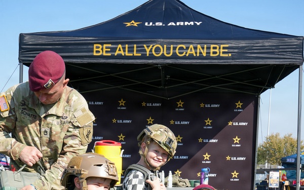 US Army Jump Masters help dawn T11 Paradchute