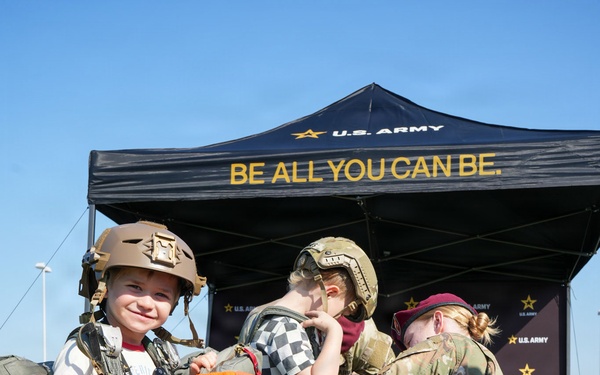 US Army Jump Masters help dawn T11 Paradchute