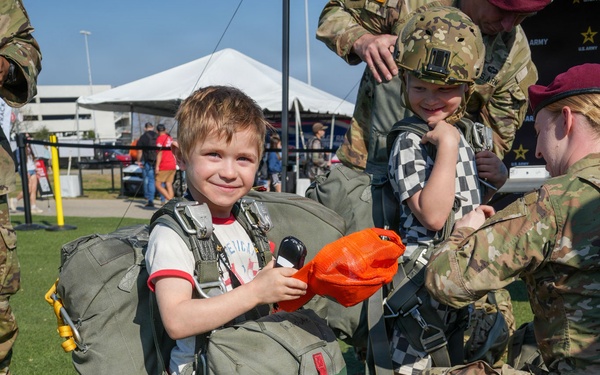 US Army Jump Masters help dawn T11 Paradchute