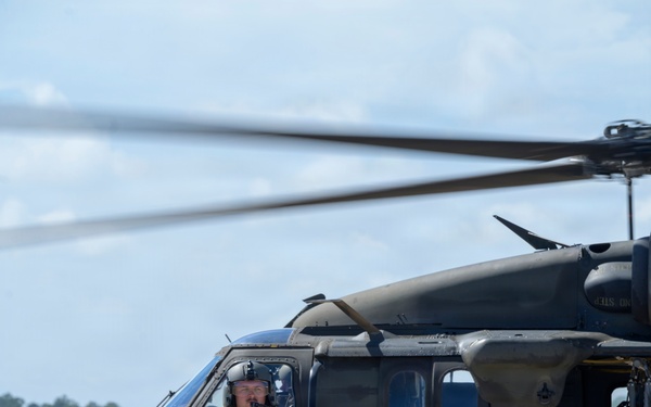 U.S. Army UH-60 Black Hawk Crew Chief Waits for Distinguished Visitors During Sentry South 26-2