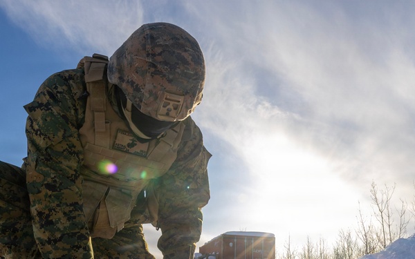 US Marines construct a field expedient antenna during ARCTIC EDGE 2026