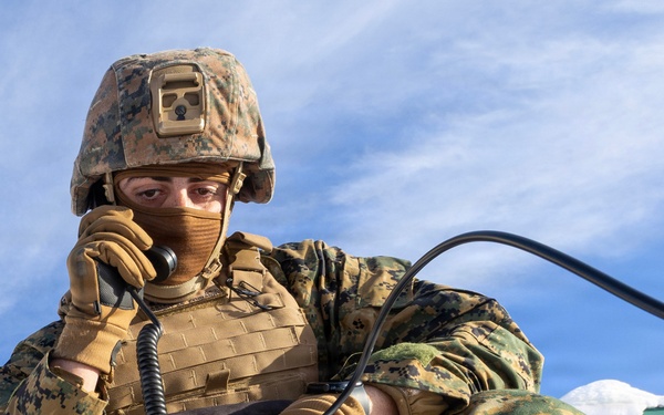 US Marines construct a field expedient antenna during ARCTIC EDGE 2026