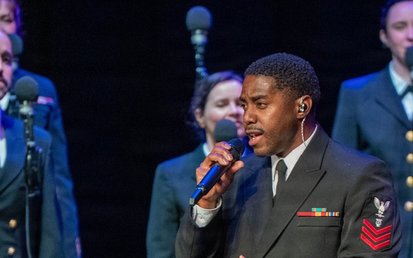Musician 1st Class Jessie Nunn of the US Navy Band Sea Chanters performs at the Sanford Performing Arts Center
