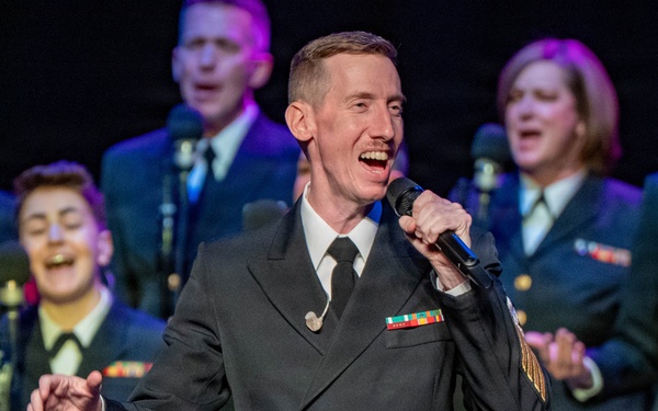 Chief Musician Adam Whitman of the US Navy Band Sea Chanters performs at the Sanford Performing Arts Center