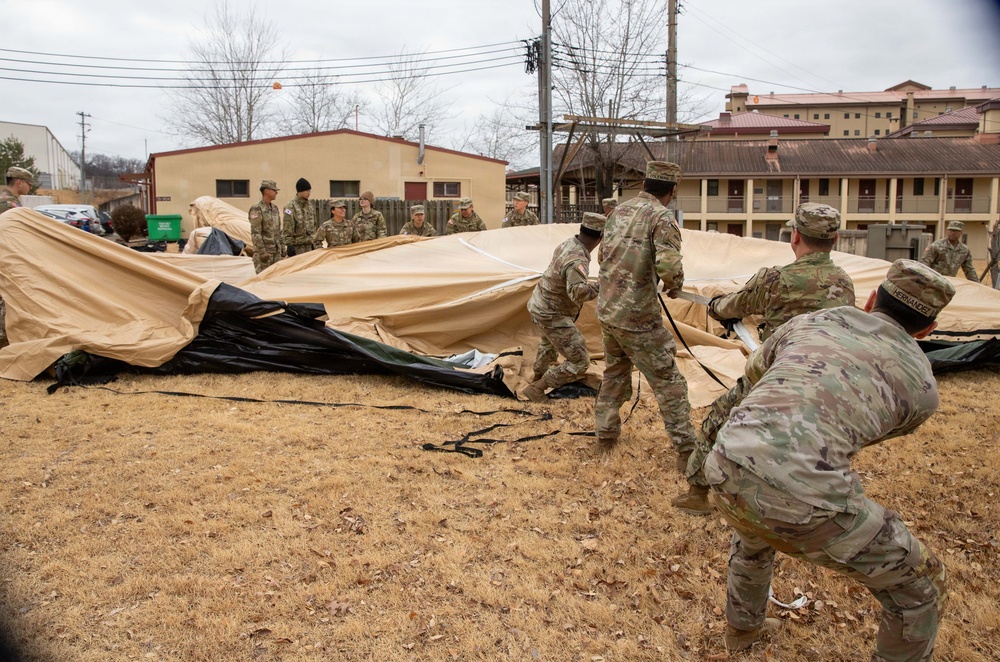 The Headquarters team from the 25th Transportation Battalion honed their skills, conducting a training exercise focused on setting up their main operations tent on Feb. 26.