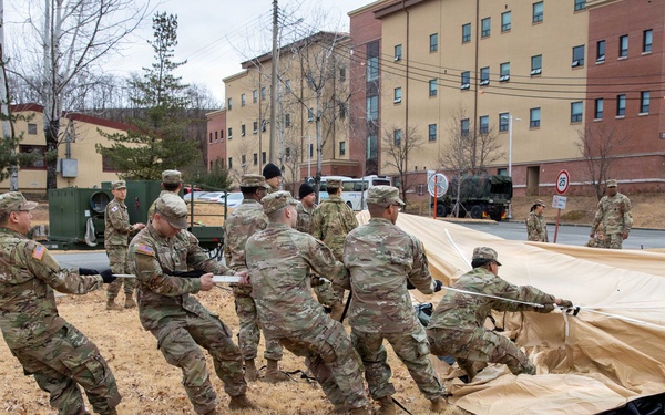 The Headquarters team from the 25th Transportation Battalion honed their skills, conducting a training exercise focused on setting up their main operations tent on Feb. 26.