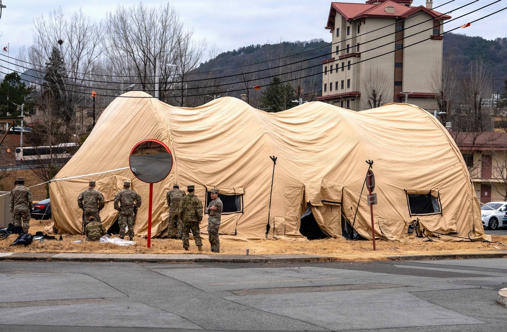 The Headquarters team from the 25th Transportation Battalion honed their skills, conducting a training exercise focused on setting up their main operations tent on Feb. 26.